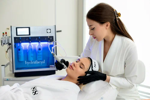 HydraFacial anti-aging therapy reducing fine lines, wrinkles, and improving skin firmness for youthful glowing skin