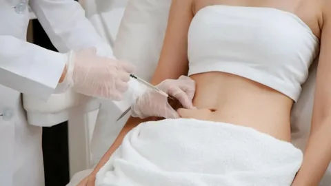 Fat dissolving drip treatment at DAG Dental & Aesthetics in DHA Lahore for body contouring